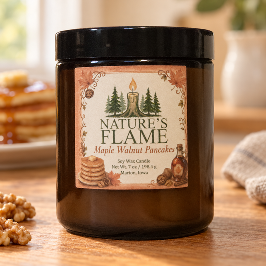 Nature's Flame Maple Walnut Pancakes 7 oz soy wax candle in an amber glass jar